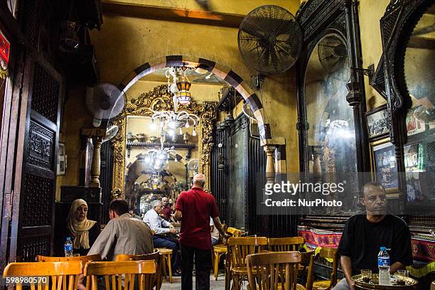 Customers sit outside the al-Fishawi cafe in Khan al-Khalili bazaar, Cairo, Egypt, 02 Sep 2016. Al-Fishawi is Egypt's most famous coffee shop. The...