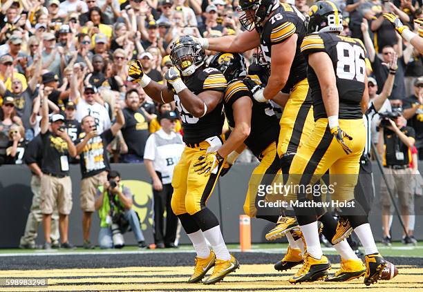 Running back LeShun Daniels of the Iowa Hawkeyes celebrates scoring a touchdown the first quarter against the Miami RedHawks on September 3, 2016 at...