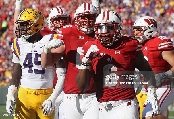 Corey Clement of the Wisconsin Badgers celebrates scoring a touchdown during the third quarter against the LSU Tigers at Lambeau Field on September...