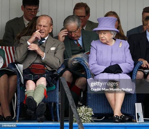 Prince Philip, Duke of Edinburgh and Queen Elizabeth II attend the 2016 Braemar Highland Gathering at The Princess Royal and Duke of Fife Memorial...