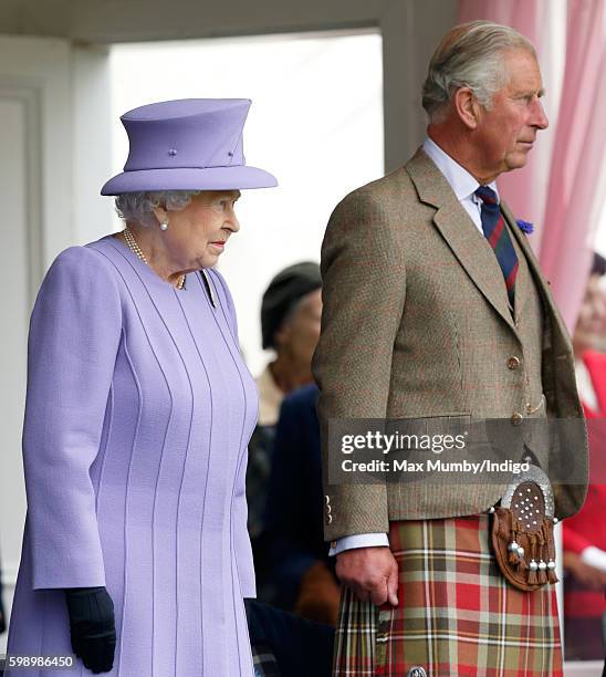 Queen Elizabeth II and Prince Charles, Prince of Wales attend the 2016 Braemar Highland Gathering at The Princess Royal and Duke of Fife Memorial...