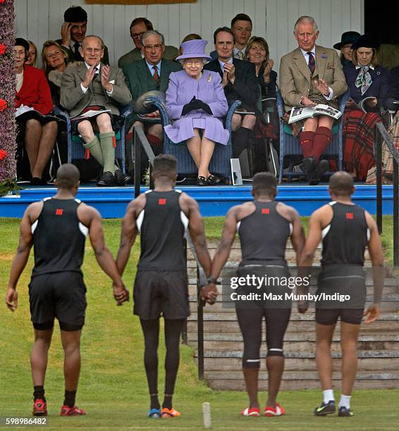 Prince Philip, Duke of Edinburgh, Queen Elizabeth II and Prince Charles, Prince of Wales attend the 2016 Braemar Highland Gathering at The Princess...