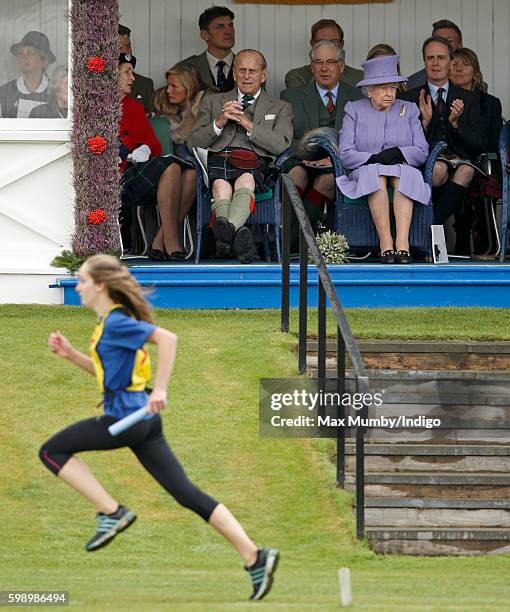 Prince Philip, Duke of Edinburgh and Queen Elizabeth II attend the 2016 Braemar Highland Gathering at The Princess Royal and Duke of Fife Memorial...