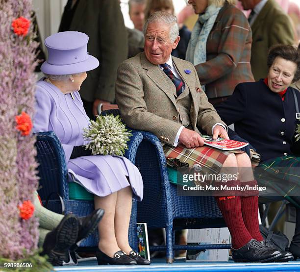 Queen Elizabeth II and Prince Charles, Prince of Wales attend the 2016 Braemar Highland Gathering at The Princess Royal and Duke of Fife Memorial...
