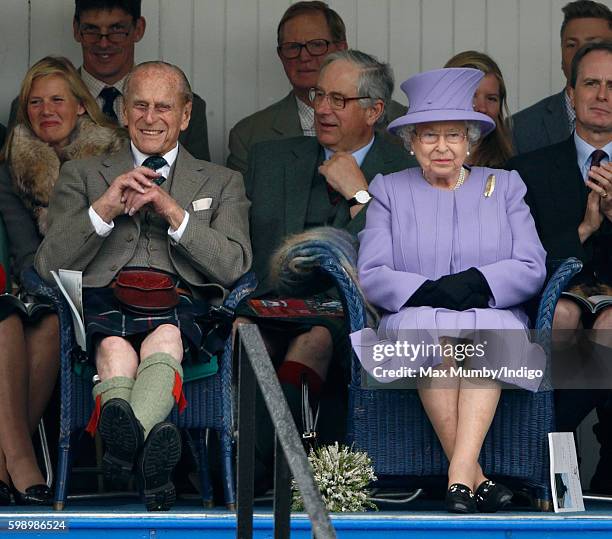 Prince Philip, Duke of Edinburgh and Queen Elizabeth II attend the 2016 Braemar Highland Gathering at The Princess Royal and Duke of Fife Memorial...