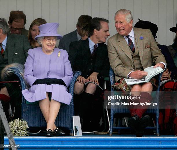 Queen Elizabeth II and Prince Charles, Prince of Wales attend the 2016 Braemar Highland Gathering at The Princess Royal and Duke of Fife Memorial...