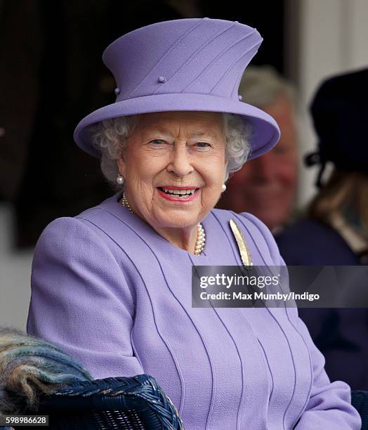 Queen Elizabeth II attends the 2016 Braemar Highland Gathering at The Princess Royal and Duke of Fife Memorial Park on September 3, 2016 in Braemar,...