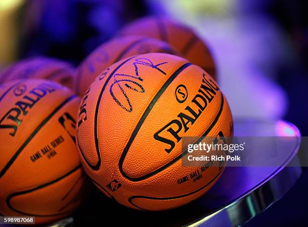 Player D'Angelo Russell signed miniature basketballs at The Ultimate Fan Experience, Call Of Duty XP 2016, presented by Activision, at The Forum on...