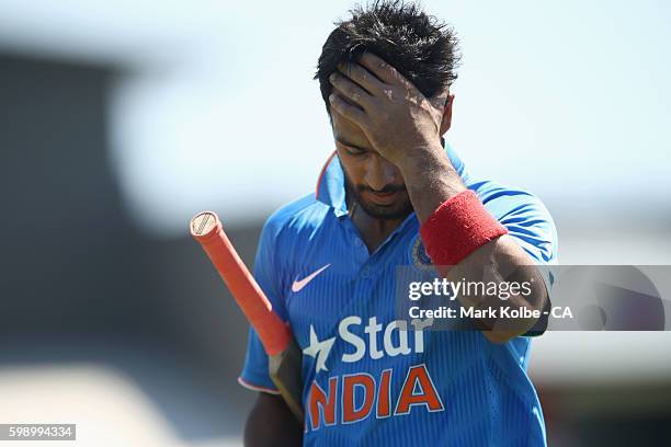 Mandeep Singh of India A looks dejected as he leaves the field after being dismissed for 95 during the Cricket Australia via Getty Images Winter...