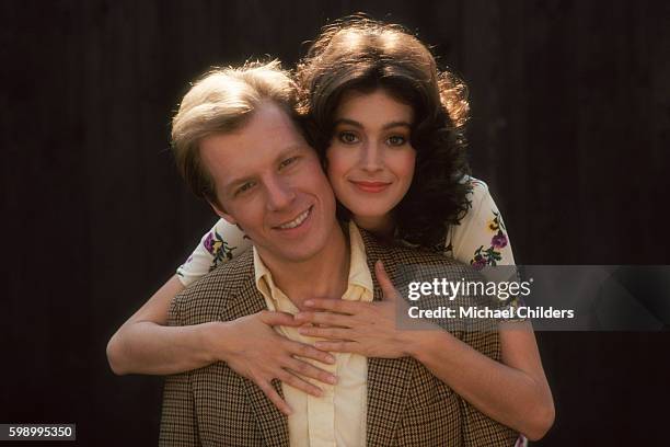 American actors Michael McKean and Sean Young on the set of Young Doctors in Love, by director, screenwriter, producer and actor Gary Marshall.