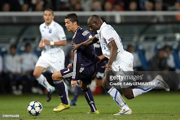 Auxerre's Adama Coulibaly and Madrid's Cristiano Ronaldo during the UEFA Champions League group G match between AJ Auxerre and Real Madrid CF at...