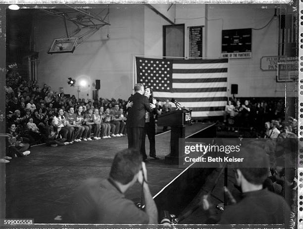Democratic presidential hopeful former Vermont Governor Howard Dean gets a hug from his wife Dr. Judith Steinberg Dean after she introduced him to a...