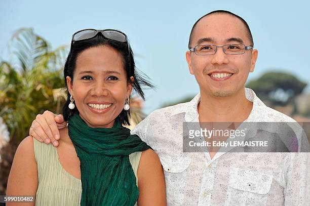 Apichatppong Weerasethakul and Wallapa Mongkolprasert at the photo call for ?Uncle Boonmee Who Can Recall His Past Lives? during the 63rd Cannes...