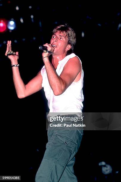 British New Wave musician Cy Curnin, of the Fixx, performs onstage at the Poplar Creek Music Theater, Hoffman Estates, Illinois, July 5, 1986.