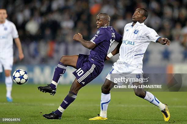 Auxerre's Dennis Oliech and Madrid's Lassana Diarra during the UEFA Champions League group G match between AJ Auxerre and Real Madrid CF at...