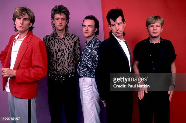 Portrait of British New Wave group the Fixx as they pose at Penn State University, State College, Pennsylvania, September 23, 1984. Pictured are,...