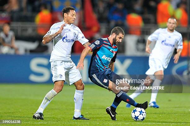 Lyon's Lisandro Lopez and Schalke's Jermaine Jenas during the UEFA Champions League Group B match between Olympique Lyonnais and FC Schalke 04 at the...