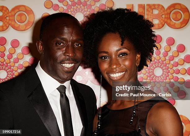 Michael Kenneth Williams and guest arrive at the HBO After-Party held to honor the 63rd Primetime Emmy Awards.