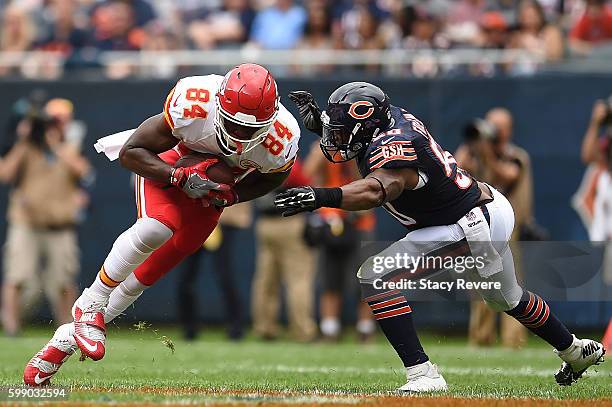 Demetrius Harris of the Kansas City Chiefs is brought down by Danny Trevathan of the Chicago Bears during a game at Soldier Field on August 27, 2016...