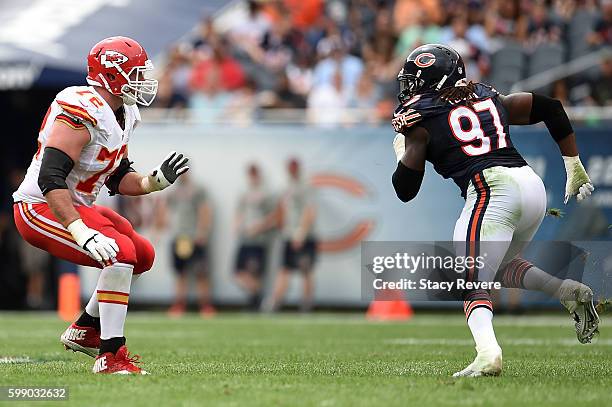 Eric Fisher of the Kansas City Chiefs works against Willie Young of the Chicago Bears during a game at Soldier Field on August 27, 2016 in Chicago,...