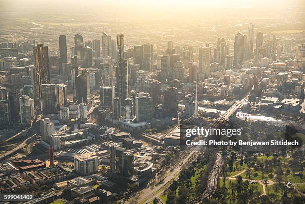 aerial view of melbourne city at dusk - melbourne skyline stock-fotos und bilder