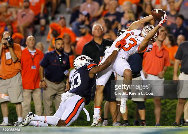 Hunter Renfrow of the Clemson Tigers scores a touchdown during the fourth quarter against Johnathan Ford of the Auburn Tigers at Jordan Hare Stadium...