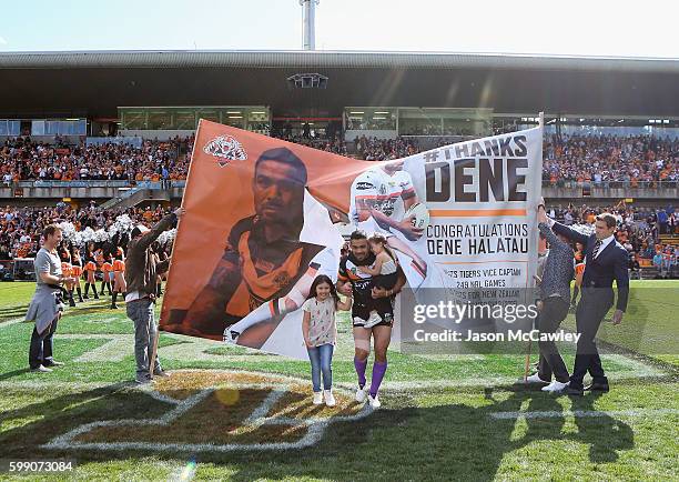 Dene Halatau of the Tigers makes his way onto the field during the round 26 NRL match between the Wests Tigers and the Canberra Raiders at Leichhardt...