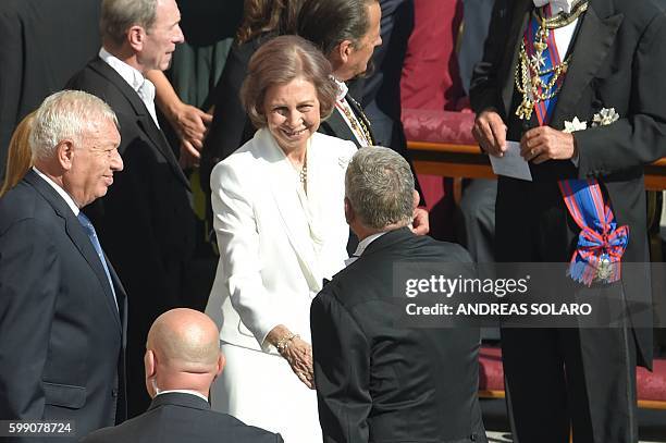 Queen Sophia of Spain shakes hands during the ceremony for the canonisation of Mother Teresa of Kolkata, on Saint Peter square in the Vatican, on...
