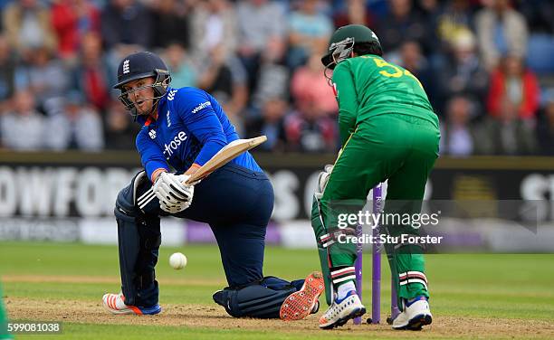 England player Jason Roy hits out watched by wicketkeeper Sarfraz Ahmed during the 5th One Day International between England and Pakistan at Swalec...