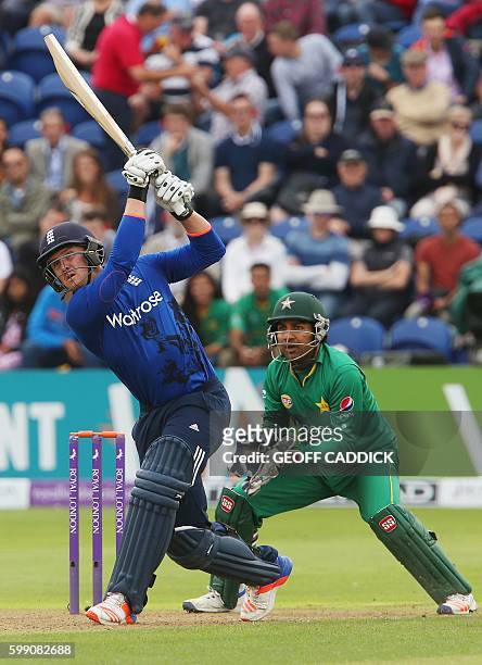 England's Jason Roy plays a shot as Pakistan's Sarfraz Ahmed keeps wicket during play in the fifth one day international cricket match between...