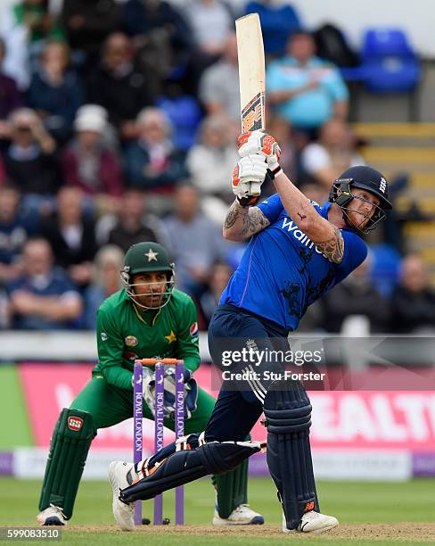 England player Ben Stokes hits a six watched by wicketkeeper Sarfraz Ahmed during the 5th One Day International between England and Pakistan at...