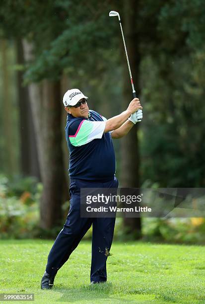 Peter O'Malley of Australia plays his second shot into the second green during the final round of the Travis Perkins Masters played on the Duke's...