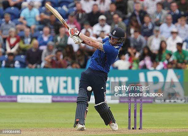 England's Ben Stokes is hit by the ball as he attempts a shot during play in the fifth one day international cricket match between England and...