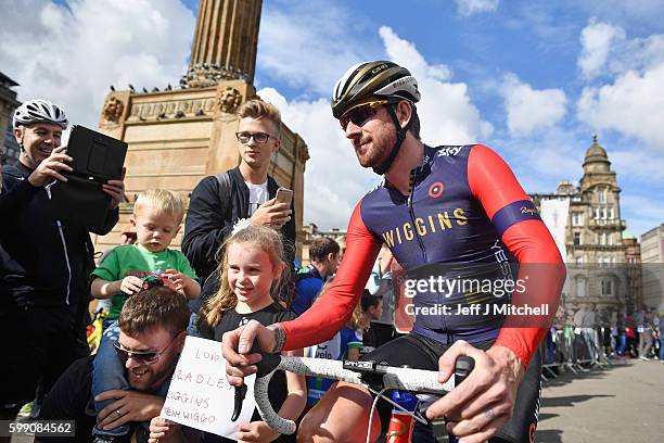 Cyclist Sir Bradley Wiggins, makes his way through the crowd prior to the start of stage 1 of the Tour of Britain from Glasgow to Castle Douglas on...