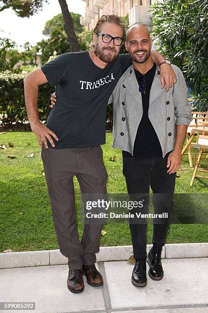 Marco D'Amore and Marco Giallini pose after the Kineo Diamanti Award press conference during the 73rd Venice Film Festival at on September 4, 2016 in...