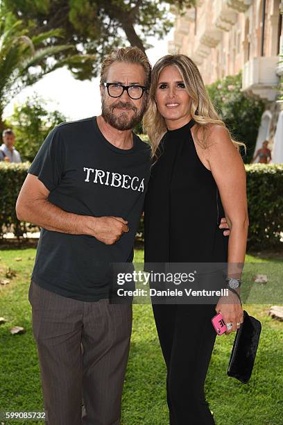 Marco Giallini and Tiziana Rocca pose after the Kineo Diamanti Award press conference during the 73rd Venice Film Festival at on September 4, 2016 in...