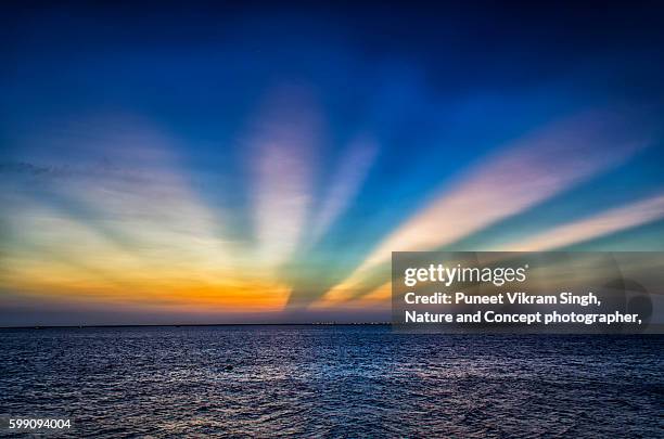 anticrepuscular rays - miracle stock pictures, royalty-free photos & images