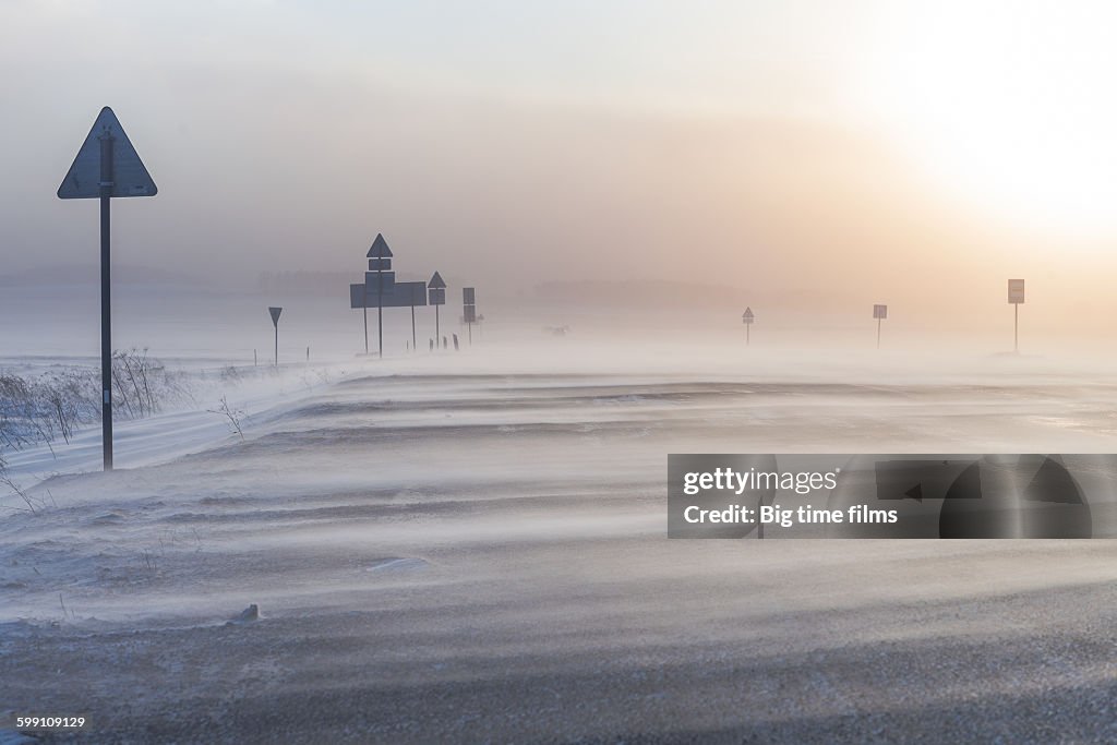 Snowstorm on the winter road