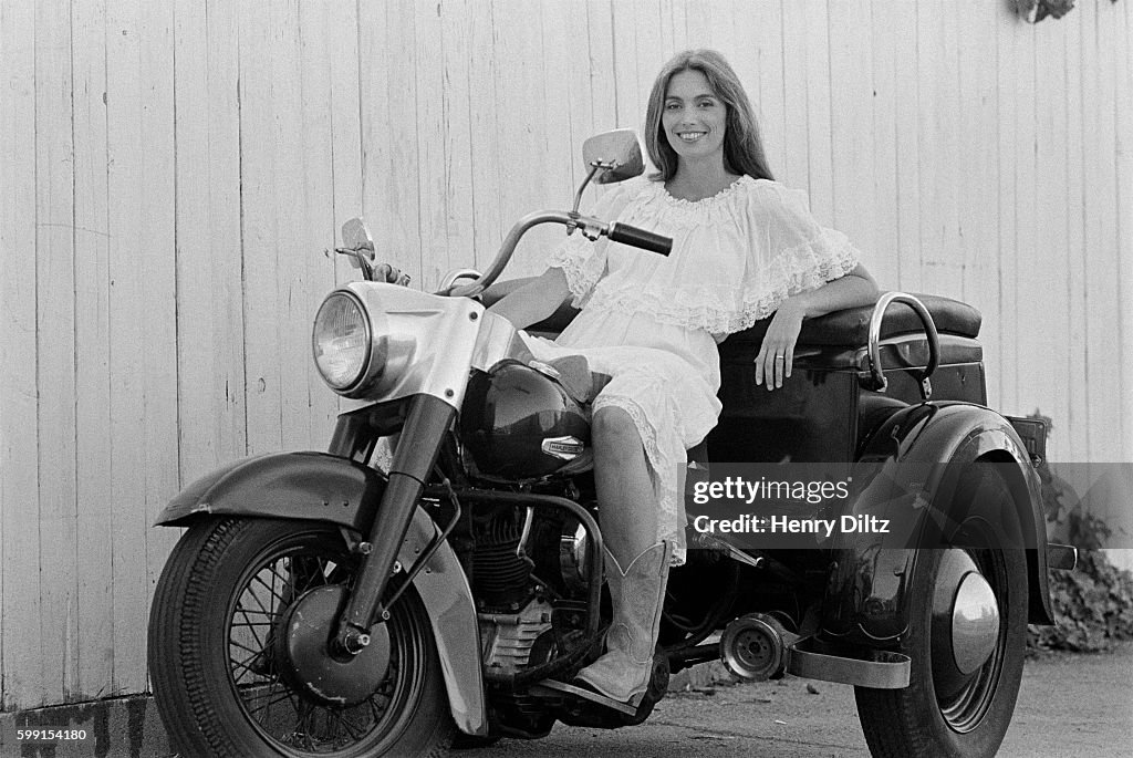 Emmylou Harris on a Motorcycle
