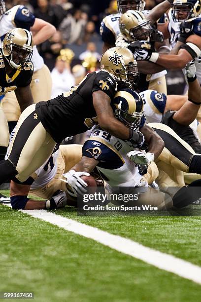 December 2010; Rams at the Saints, St. Louis Rams running back Steven Jackson is hit at the goal line by New Orleans Saints linebacker Marvin...