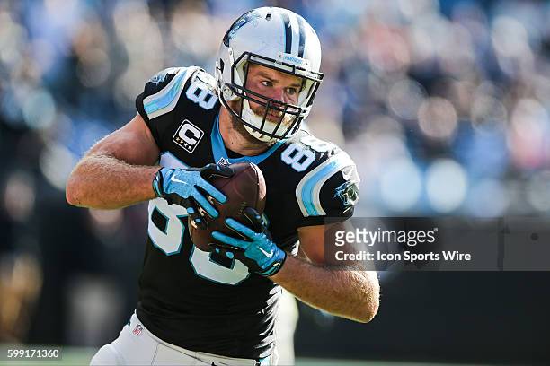 Carolina Panthers tight end Greg Olsen hauls in the catch during the game between Washington and Carolina at Bank of America Stadium in Charlotte,...
