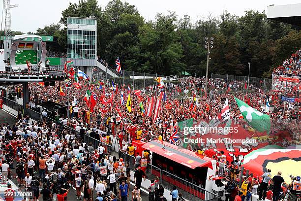 Nico Rosberg of Germany and Mercedes GP, Sebastian Vettel of Germany and Ferrari celebrate on the podium during the Formula One Grand Prix of Italy...