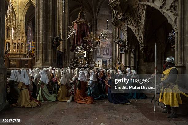 People wearing historical costumes take part in a two-day re-enactment of crowning celebrations from September 2, 1347 when Charles IV was crowned...