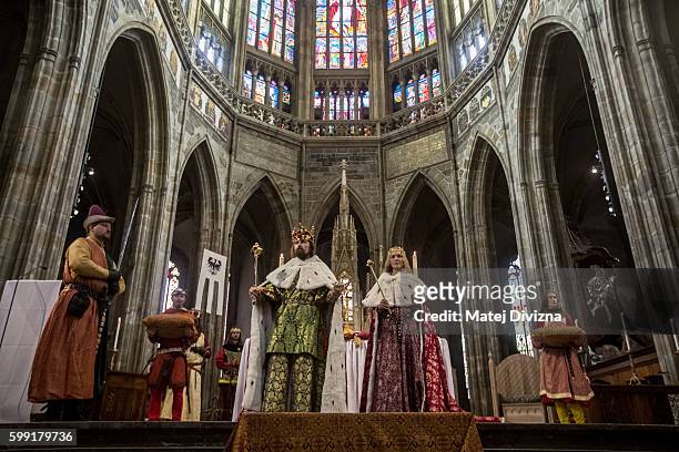 Man representing the King Charles IV and a woman representing the Queen Blanche of Valois take part in a two-day re-enactment of crowning...