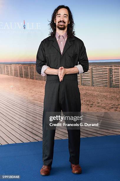 Jason Lew poses at a photocall during the 42nd Deauville American Film Festival on September 4, 2016 in Deauville, France.