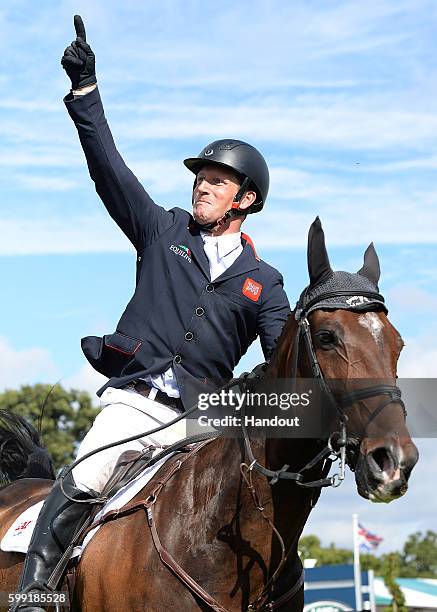 Oliver Townend of Great Britain riding Samuel Thomas II looks on during the showjumping during The Land Rover Burghley Horse Trials 2016 on September...