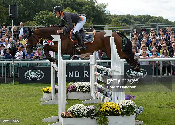 Christopher Burton riding Nobilis 18 in action durin the showjumping during The Land Rover Burghley Horse Trials 2016 on September 4, 2015 in...