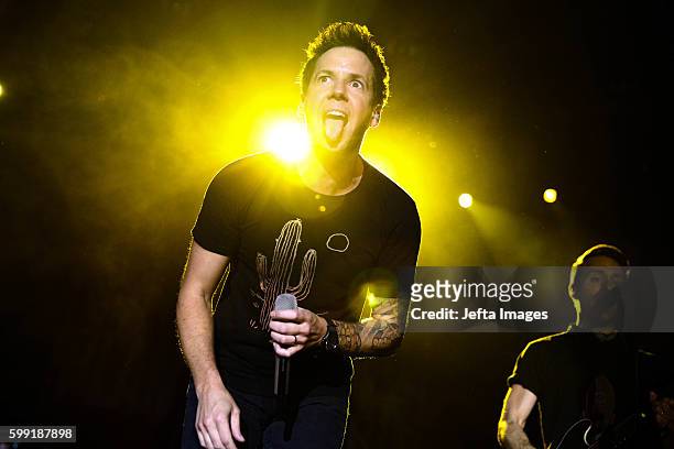 Singer Pierre Bouvier of French-Canadian band Simple Plan, performs on stage during the "Taking One For The Team Tour", on September 04, 2016 in...