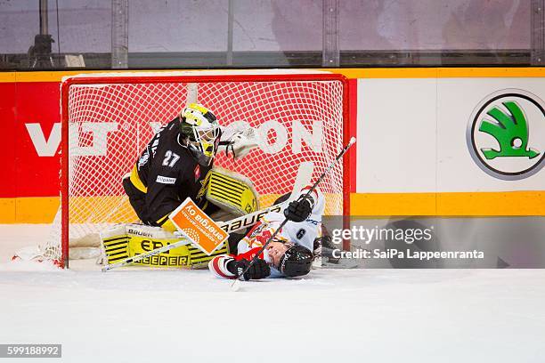 Jussi Markkanen of SaiPa Lappeenranta and Johan Forsberg of Lulea Hockey during the Champions Hockey League match between SaiPa Lappeenranta and...