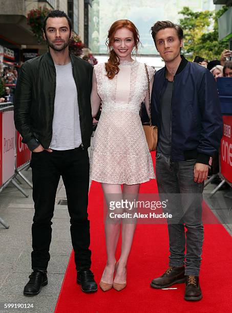 Aidan Turner, Eleanor Tomlinson and Jack Farthing attend a preview screening for series two of BBC drama 'Poldark' at the White River Cinema on...